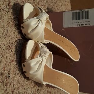 White heeled sandals